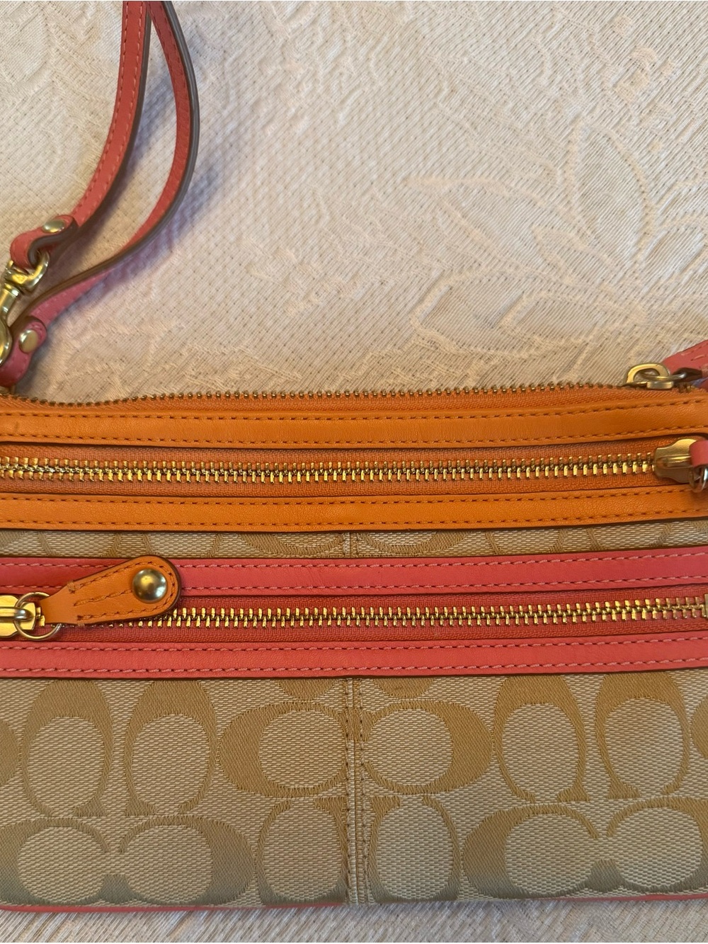 Coach Beige Signature Wristlet with Orange and Coral Trim
